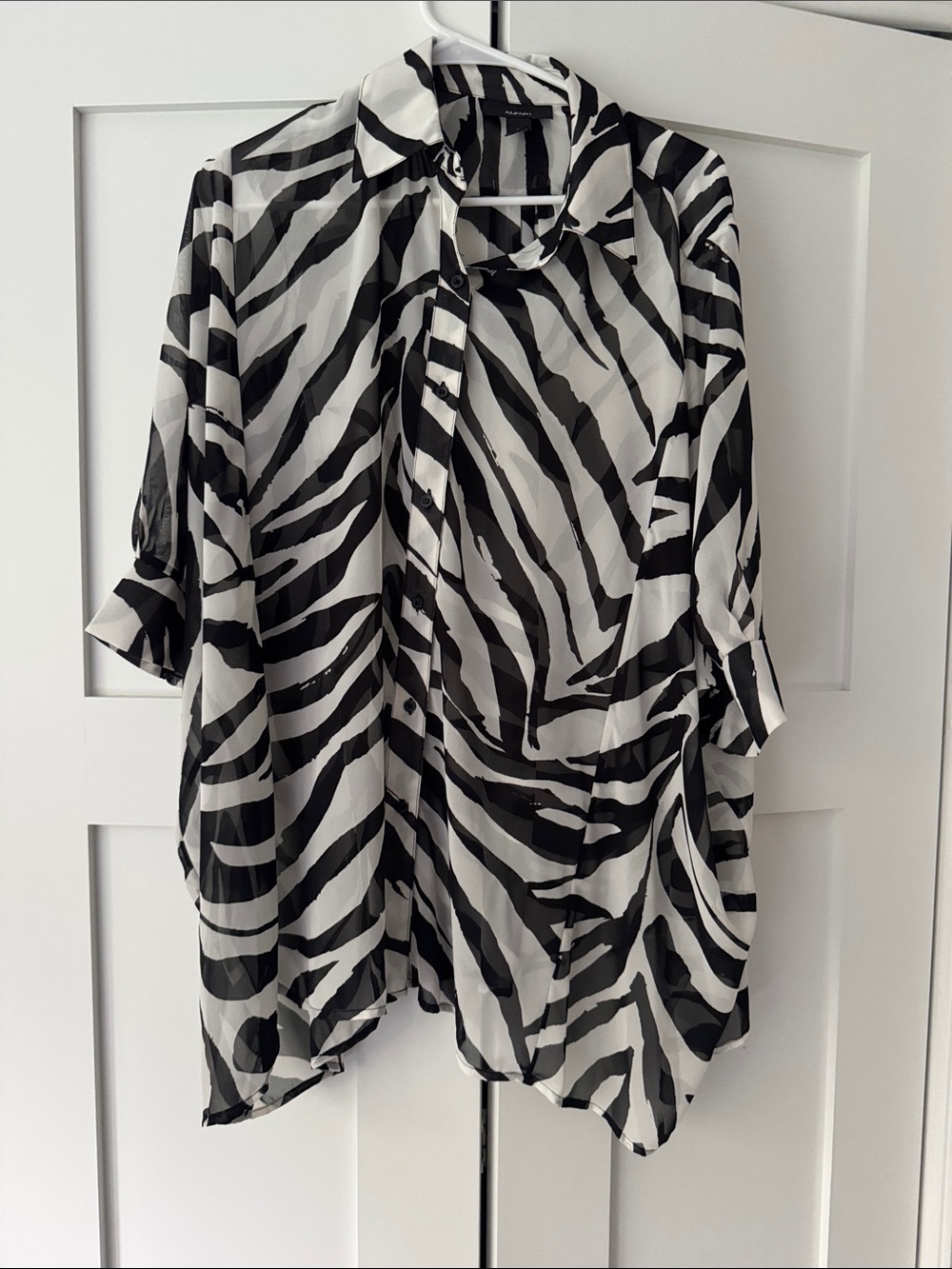 Black & White Zebra Print Button-Up Blouse, sheer and flowy.